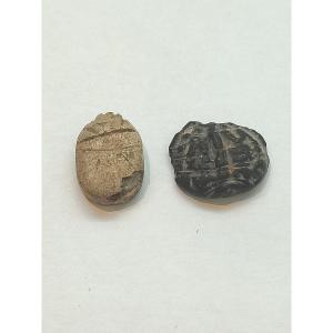 An Inscribed Scarab And An Amulet. Late Period Egypt 