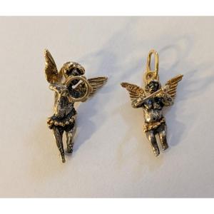 Pair Of Yellow Gold And Silver Musical Cherub Pendants