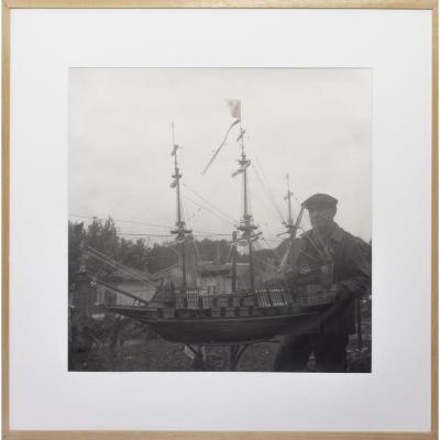 Portrait Of A Sailor With His Ship Model