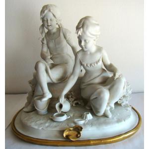 Signed Benacchio Triade, Biscuit Of A Group Of Two Young Girls Playing At The Kitchen