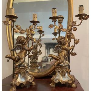 Pair Of Putti Lamps With Gold And Silver Patina 