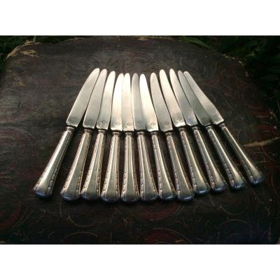 Twelve Silver Metal Knives
