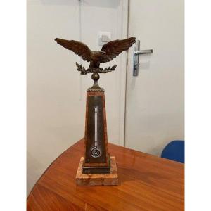 Thermometer On Marble Column And Bronze Eagle