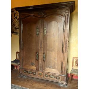 Solid Mahogany Château Malouine Armoire. France, Regency Period, Early 18th Century. 