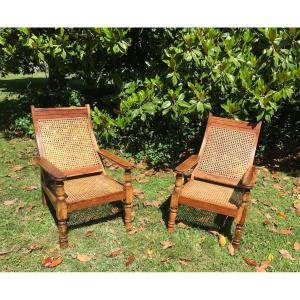 Pair Of Colonial-style Teak Planter Armchairs. Mid 20th Century.