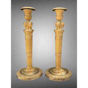 A Pair Of Gilt Bronze Candlesticks From The First Empire Period.