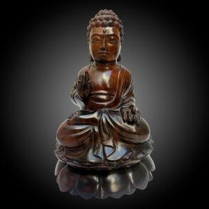 Buddha Statue In Carved Rosewood From The Njana Tilem Gallery In Bali