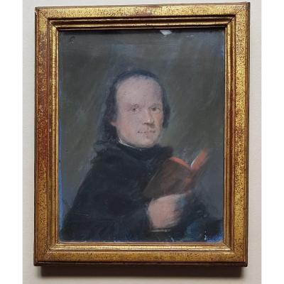 Man Holding An 18th Century Pastel Book