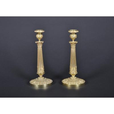 Pair Of Charles X Period Candlesticks In Gilded Bronze