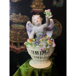 Pretty Meissen Cherub  With Basket Of Flowers