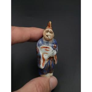 Netsuke - Monkey Disguised As A Sambaso Dancer - Porcelain - Late 19th Century