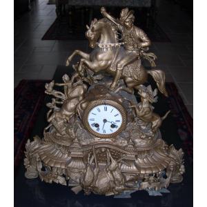 Large Antique Clock In Gilded Regula From The Late 19th Century, Depicting A Horse Stag Chase.