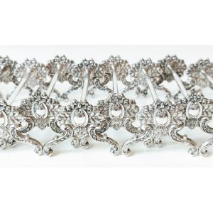 Twelve Solid Silver Knife Holders 