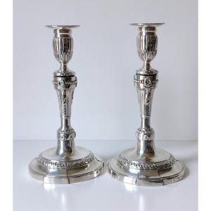 A Pair Of Solid Silver Candlesticks, 18th Century 