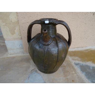 A Glazed Earthenware Jug From The Early 19th Century