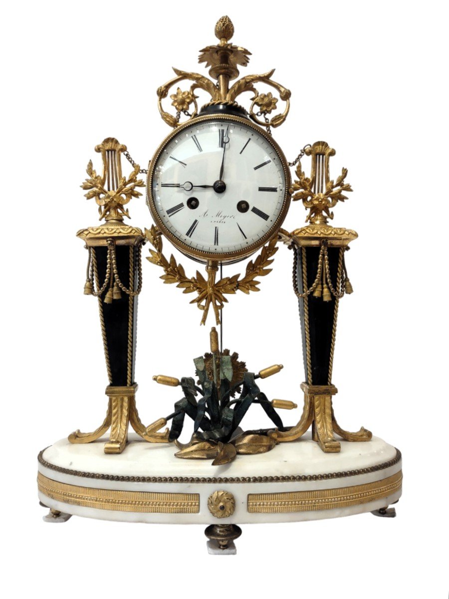 Orologio Luigi XVI in marmo e bronzo dorato
