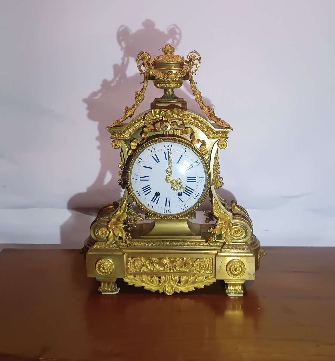 OROLOGIO A PENDOLO IMPERO IN BRONZO DORATO PRIMI DEL XIX SECOLO