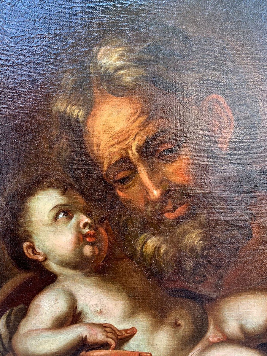 San giuseppe e Gesù bambino, olio su tela del seicento su cornice di origine a finto marmo.-photo-2