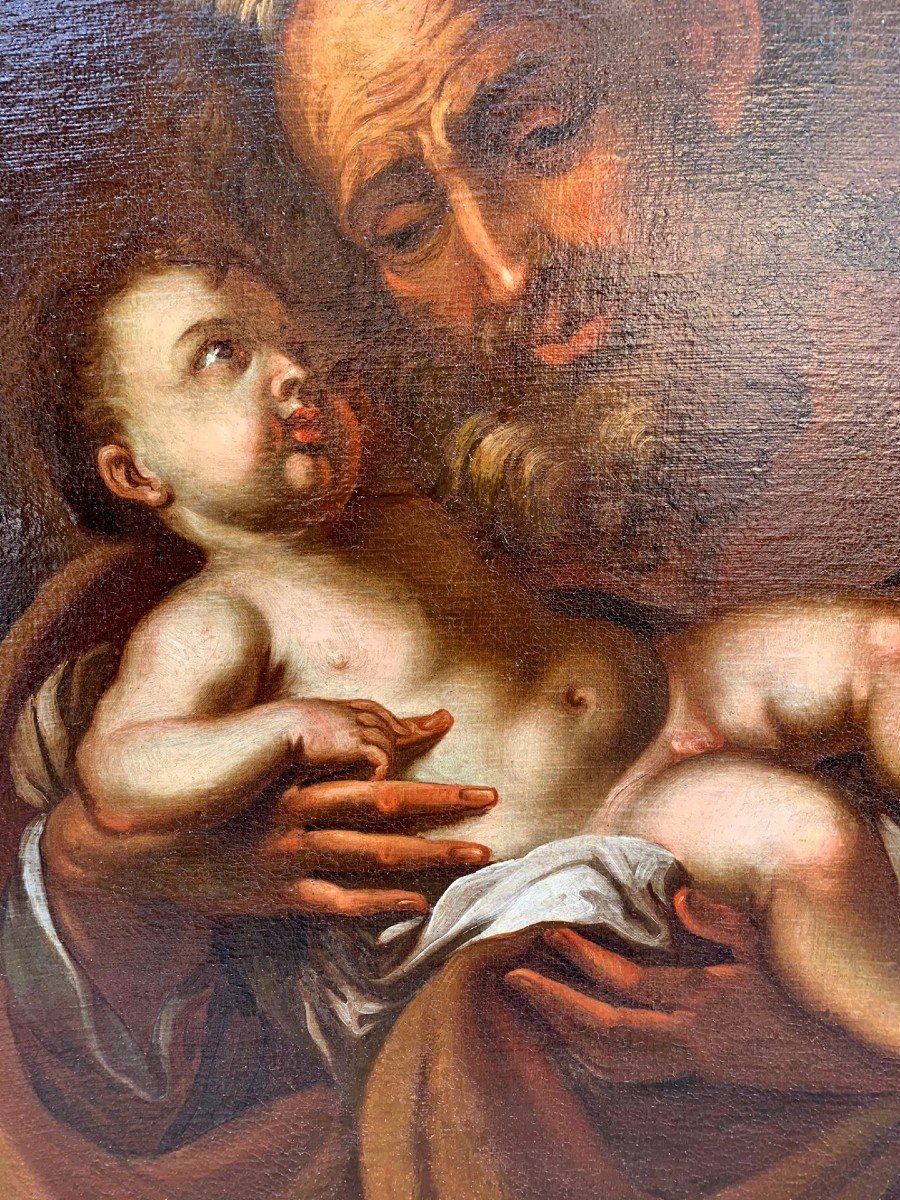 San giuseppe e Gesù bambino, olio su tela del seicento su cornice di origine a finto marmo.-photo-3