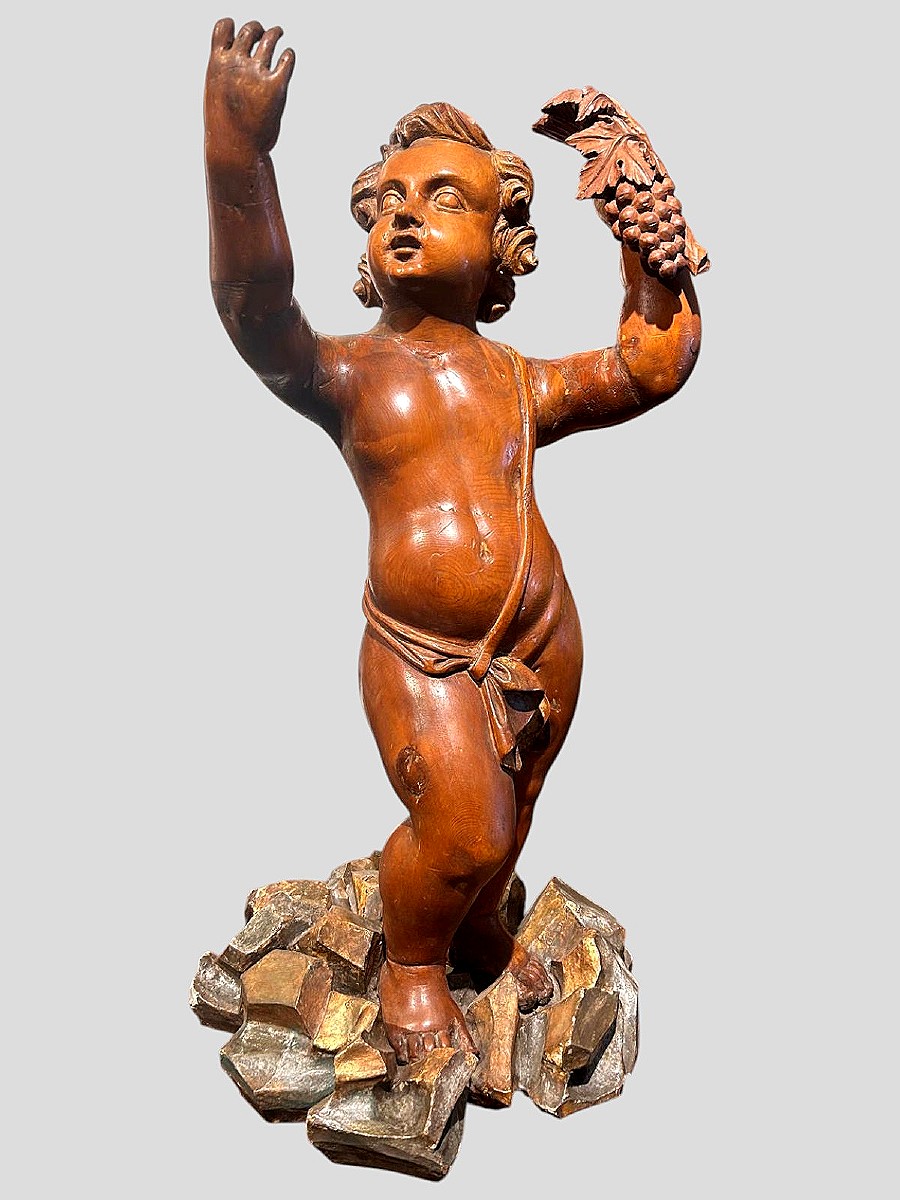Scultura in legno di cirmolo allegoria bacchica. (72cm alt.)