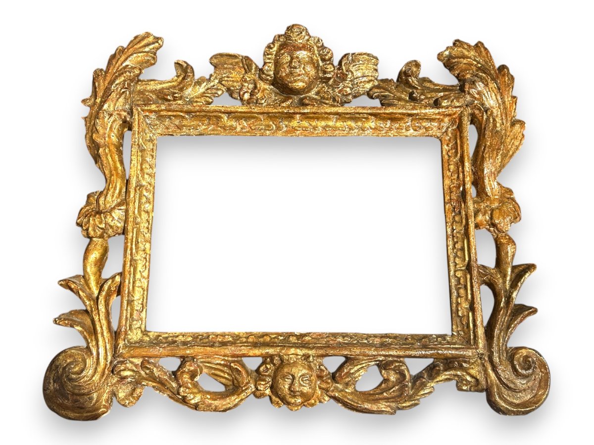 Antica cornice italiana intagliata del XVIII secolo.