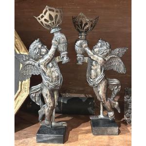 Coppia di putti reggi lume della prima metà dell'Ottocento, Francia.