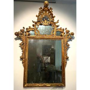 Importante specchiera veneziana della prima metà del XVIII secolo. (175x 130)