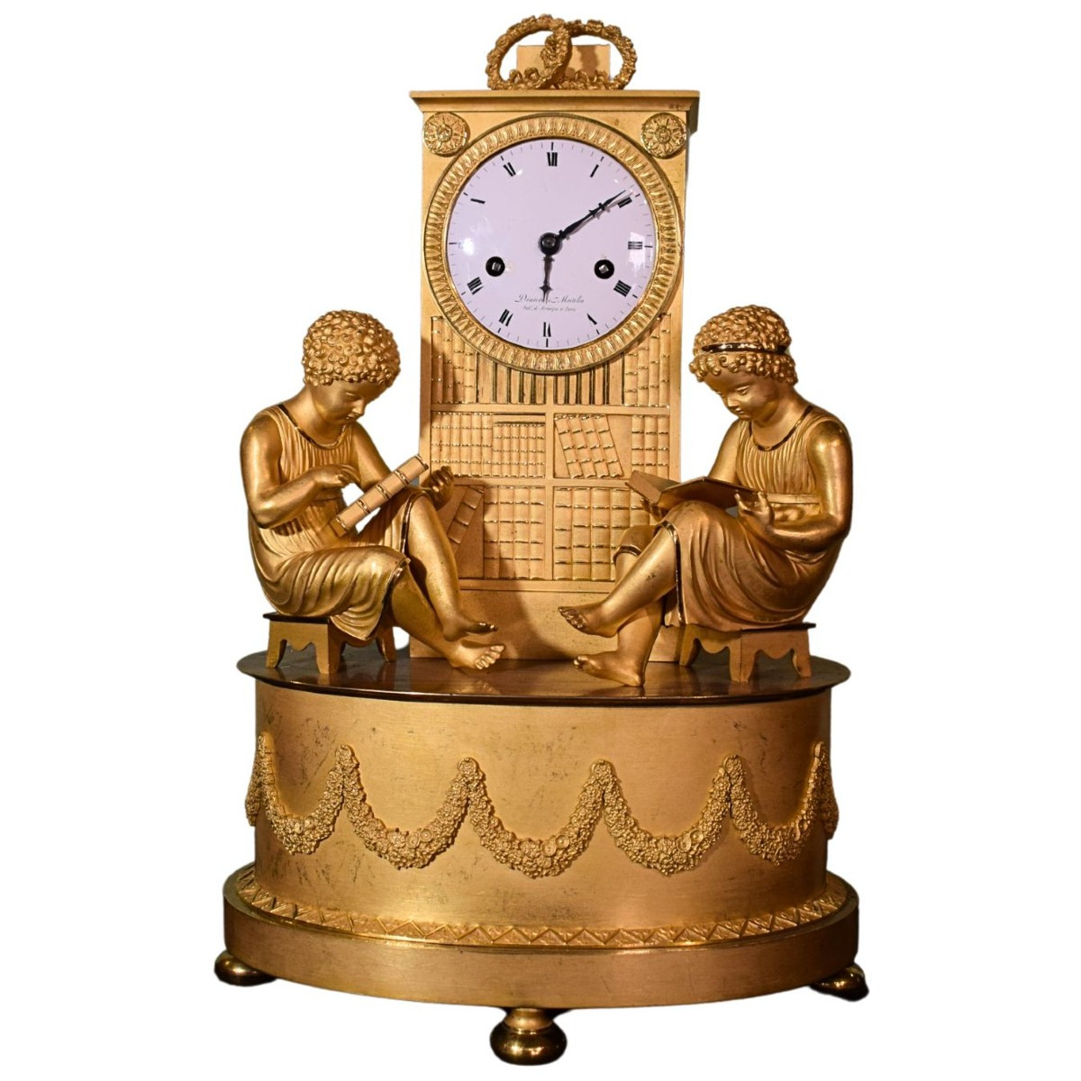 Orologio da camino in bronzo dorato – “Lettura e Conoscenza”, Denière à Paris, Primo Impero