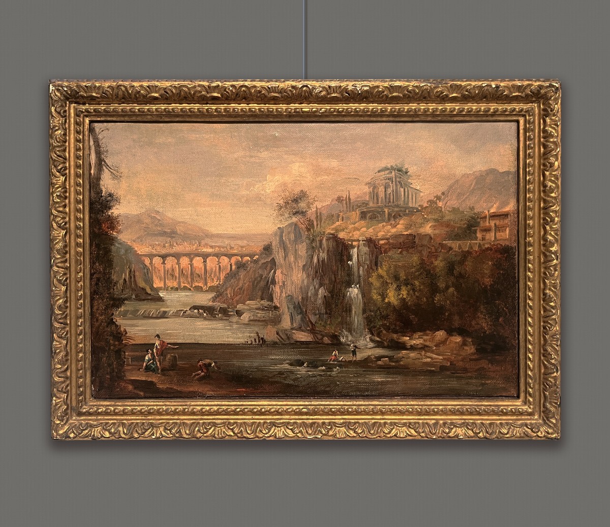 Scuola romana del XVIII secolo, Paesaggio con cascata, architetture e figure