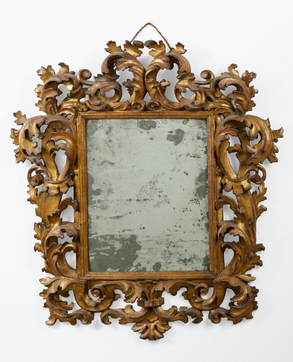 Importante specchiera in cornice di legno intagliato e dorato – XVIII secolo