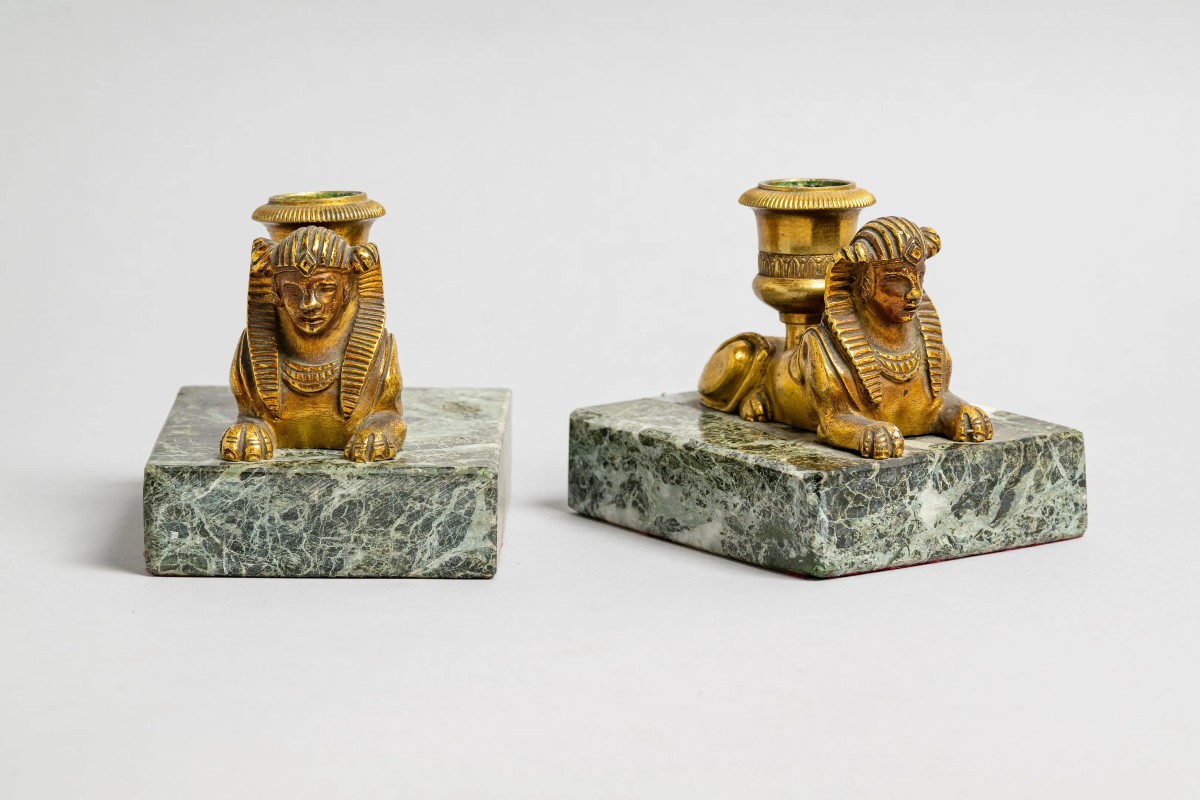 Coppia di candelieri in bronzo dorato stile Impero