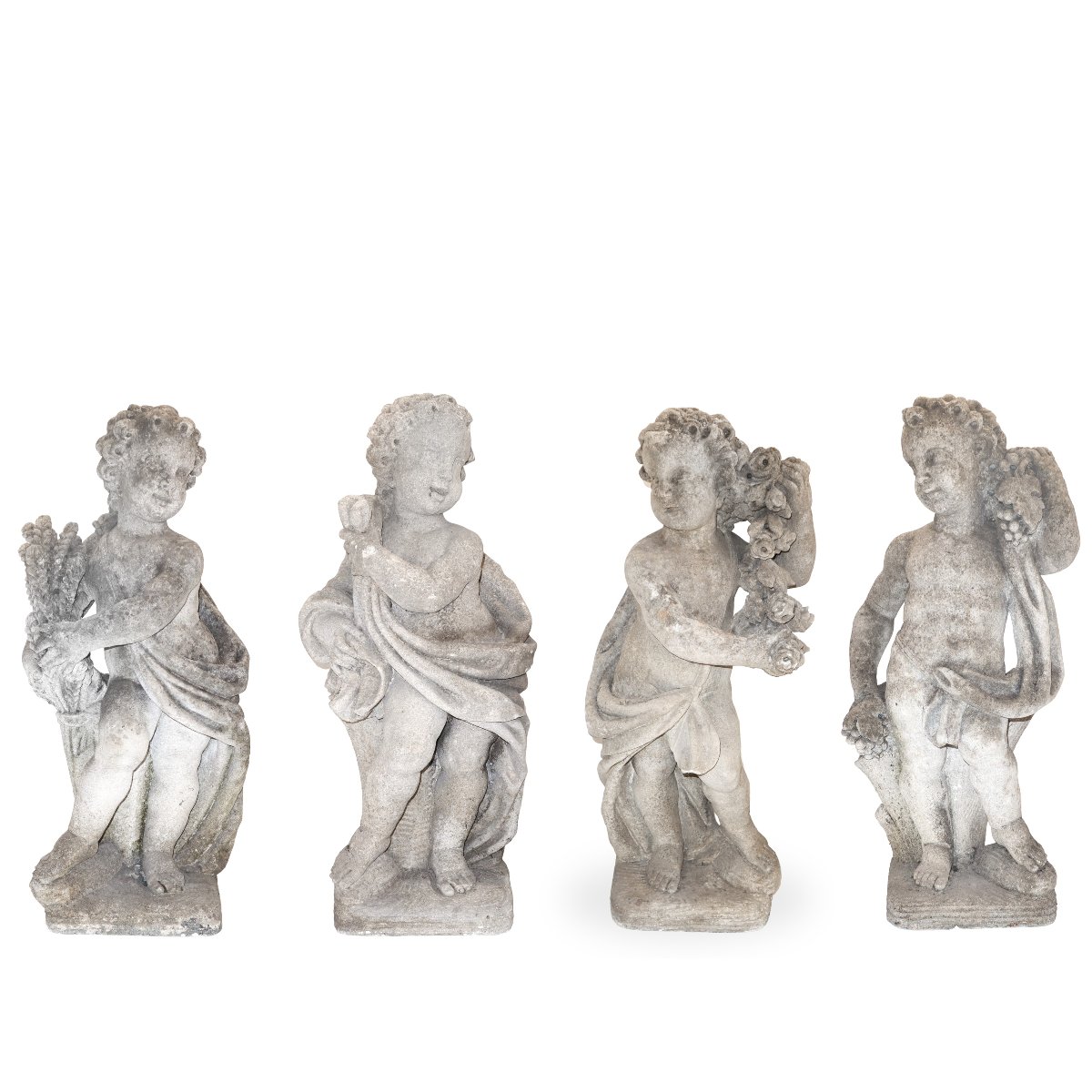 Gruppo di quattro putti in pietra calcarea raffiguranti le Quattro Stagioni, fine XIX secolo
