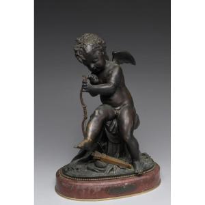 Cupido che fabbrica il suo arco