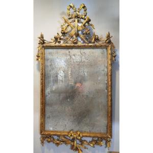 Coppia di specchi Luigi XVI in legno dorato con specchi antichi al mercurio
