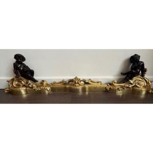 Fireplace Bar In Gilded Bronze With Brown Patina Decorated With Louis XVI Cherubs