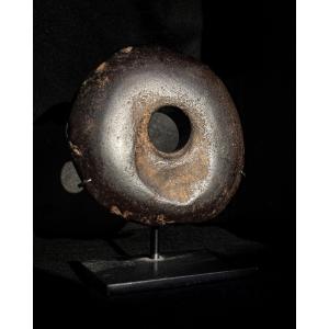 Stone Club Head Or Disc-shaped Club Head On A Base