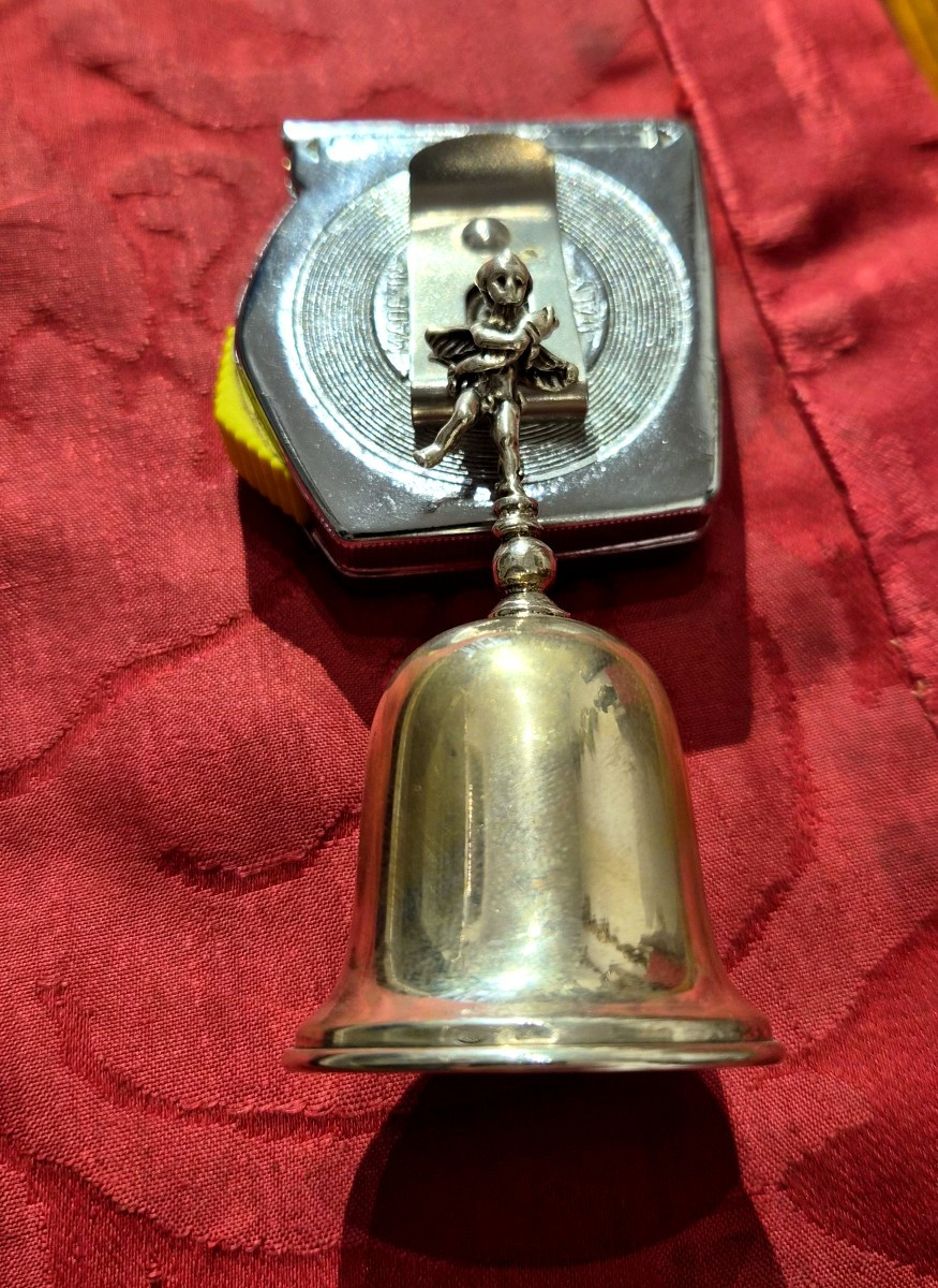 Campanellino in argento da tavolo con putto e tritone-photo-2
