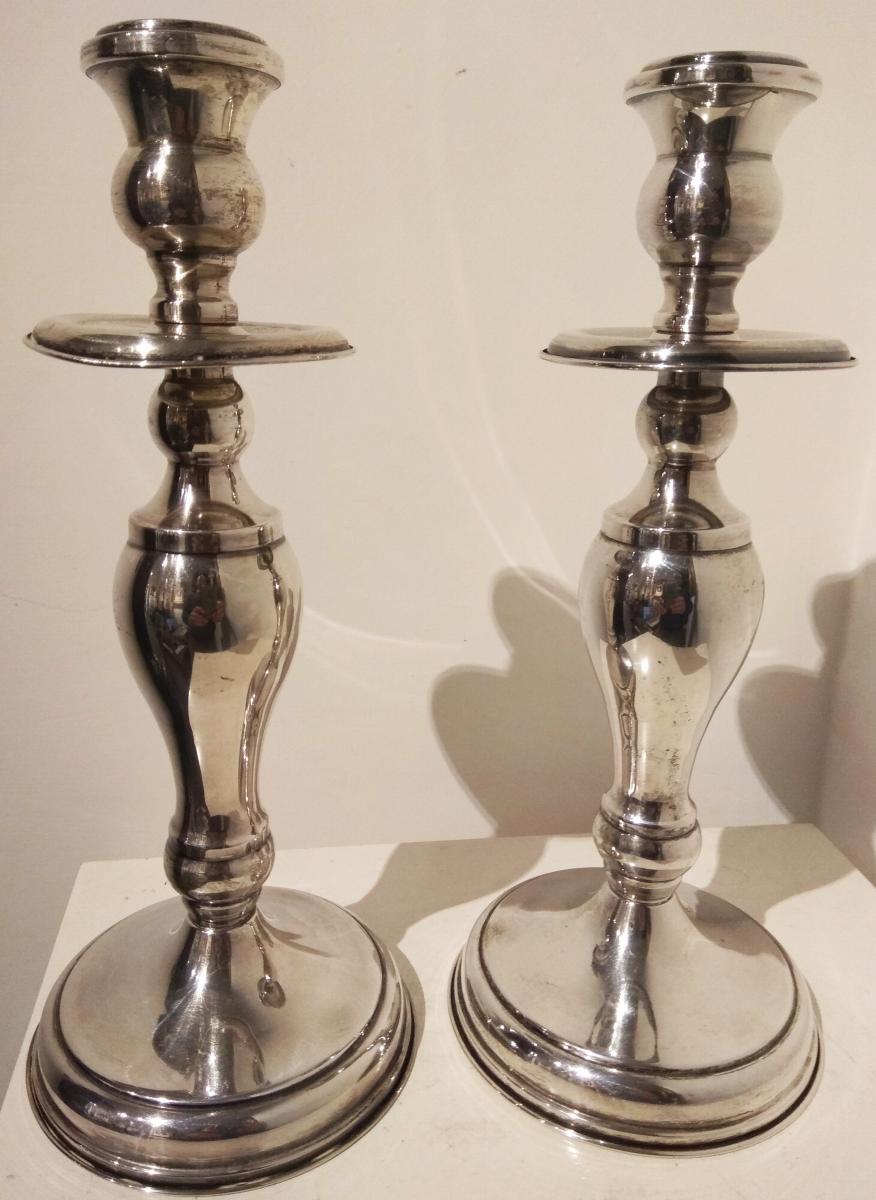 Coppia di candelieri in argento