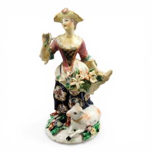 Bow Porcelain Figure Of A Lady With Lamb And Flowers, C.1760