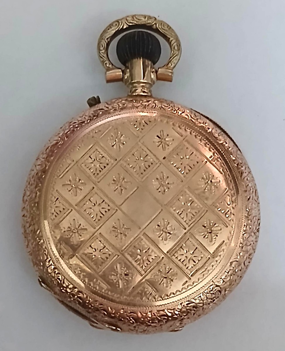 Orologino svizzero  da donna cesellato in oro 12 kt - 'occhio di bue' - funzionante.-photo-2