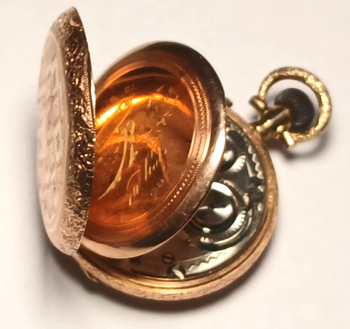 Orologino svizzero  da donna cesellato in oro 12 kt - 'occhio di bue' - funzionante.-photo-3