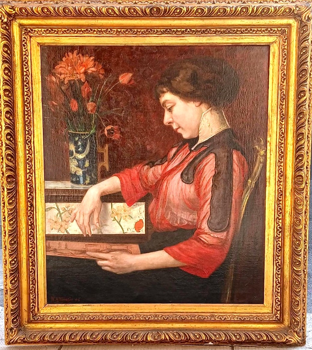 Natala Attanasio : ' La Ragazza che sfoglia l'Album'  datato 1896.