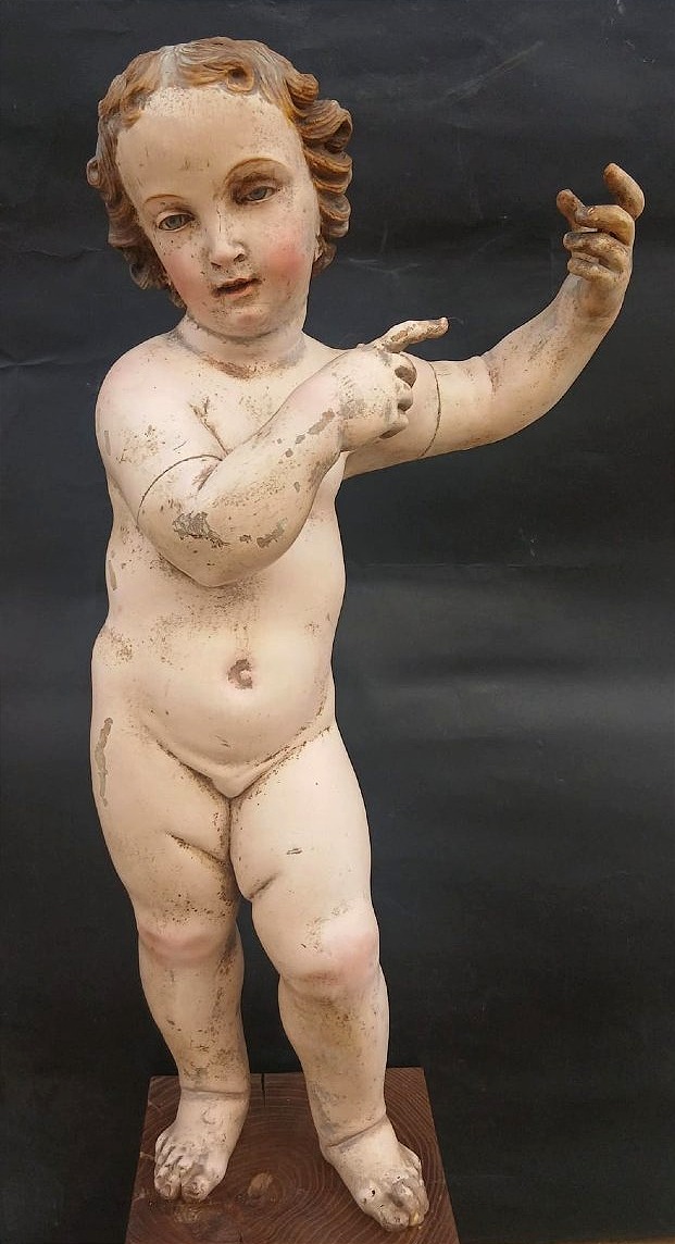 Bambinello napoletano in legno scolpito e laccato databile tra la fine il XVII e il XVIII-cm.54