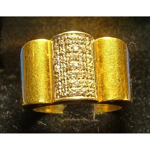 Anello firmato 'Ira Furstenberg' in oro 18 e brillantini kt. 0,25. Peso gr. 8,3 