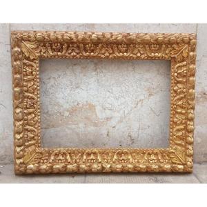 Cornice italiana  scolpita con pere, corucopie di abbondanza e foglie d'acanto. Oro al mercurio