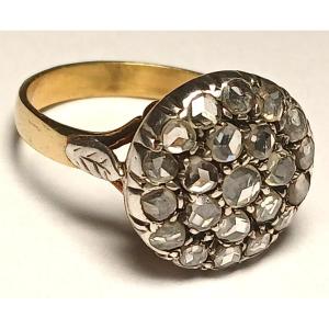 Anello a toppa in oro 18 kt e coppella, con rose di diamante kt. 070 circa