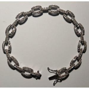 Bracciale snodabile in oro bianco e brillantini anni 60'.  Cm.18 - peso gr 13.- Brill. kt 1,70.