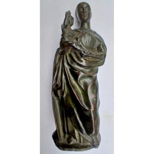 Madonna con Bambino . Scultura in bronzo Franco-Fiamminga degli inizi del XVI secolo. 