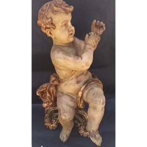 Putto ligneo laccato e dorato. Genova  XVII secolo , cm 66 su basamento dorato Luigi XVI.