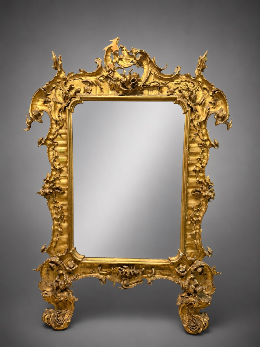 Specchiera in legno intagliato e dorato Germania Sec. XIX